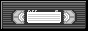 a black VHS tape in the size of a button