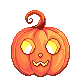 a spooky pumpkin with a face cut out in it that glows from inside